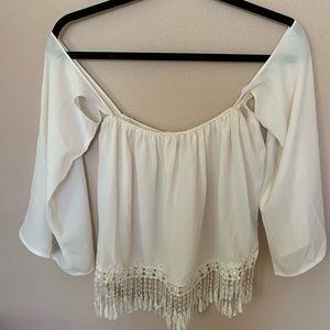 Over the shoulder cream top